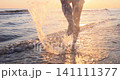 Happy young woman having fun at the beach. Slow motion 141111377
