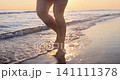 Happy young woman having fun at the beach. Slow motion 141111378