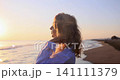 Happy young woman having fun at the beach. Slow motion 141111379