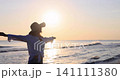 Happy young woman having fun at the beach. Slow motion 141111380