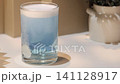 Cleaning dental retainer in water with effervescent tablet 141128917