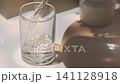 Cleaning dental retainer in water using an effervescent tablet 141128918