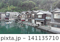 The "boathouses" of Ine, Kyoto, a beautiful streetscape of traditional houses lining an inlet of the Sea of Japan, captured by sliding to the left. 141135710