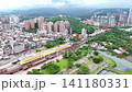 Urban infrastructure in Tamsui, Taiwan | Aerial footage overlooking the train station and residential area Urban infrastructure in Tamsui, Taiwan | Aerial footage overlooking the train station and residential area 141180331