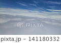 A beautiful sea of clouds viewed from an airplane flying overhead | Aerial photography A beautiful sea of clouds viewed from an airplane flying overhead | Aerial photography 141180332