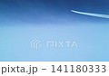 A scene of an airplane wing against a beautiful blue sky with a gradient of colors. A scene of an airplane wing against a beautiful blue sky with a gradient of colors. 141180333