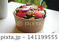 Healthy salad with tuna and fresh vegetables 141199555