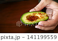 Delicious avocado preparation with unique seasoning 141199559