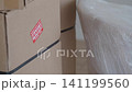 Careful handling of fragile packages in a delivery setting 141199560