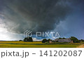 Storm clouds moving in a Timelapse. Summer storm with cumulus clouds and rain 141202087