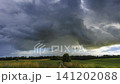 Storm clouds moving in a Timelapse. Summer storm with cumulus clouds and rain 141202088