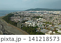 静岡県清水区・三保の松原海岸沿いの市街地と港湾の空撮映像 141218573