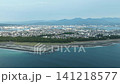 静岡県静岡市・三保の松原海岸と市街地の空撮映像 141218577