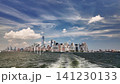 Sailing away from lower manhattan skyline view from a boat 141230133