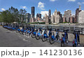 Citi bike rental station with manhattan skyline view 141230136