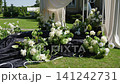 Wedding ceremony floral decorations with white flowers and elegant drapery 141242731