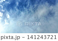 White clouds against a blue sky. Slowmotion 141243721