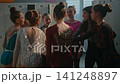Rhythmic Gymnasts Joining Hands for Team Ritual Before Entering Tournament 141248897
