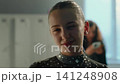 Beautiful Young Gymnast Preparing Backstage Before Competition 141248908