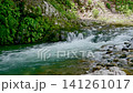 The flow of the river flowing through the valley The flow of the river flowing through the valley 141261017