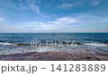 Tranquil beach surface sunlight 141283889