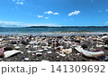 Seashells, sand, and the sea, photographed on Sarushima Island. 141309692