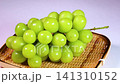 Shine Muscat grapes on a sieve, rotating 141310152