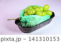A video of Shine Muscat grapes rotating in a tray. 141310153