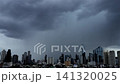 Dense cloud formations rapidly develop above Bangkok's skyscrapers before a tropical storm. 141320025