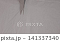 Cutting  with scissorsnwhite cotton 141337340