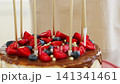 Celebrate with a delicious berry layered cake 141341461