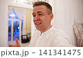 Man blogger shares moments in stylish location during evening hours 141341475