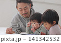 Kids playing with tablets Kids playing with tablets 141342532