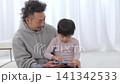Kids playing with tablets Kids playing with tablets 141342533