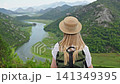 Woman overlooking Crnojevic River from Pavlova Strana viewpoint in Montenegro 141349395