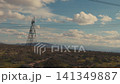 High voltage electricity pylon in a desert landscape 141349887