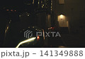 Commercial semi-truck idling at a loading dock at night 141349888