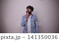 Thoughtful young man thinking and finding a solution 141350036