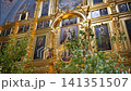 Golden iconostasis in an Orthodox church, depicting religious icons and saints 141351507