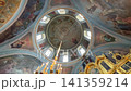 Orthodox church dome fresco painting depicting Jesus Christ and angels with chandelier 141359214