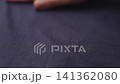 Slow motion man hand checking blue cotton shirt cloth 141362080