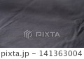 Slow motion man hand checking blue cotton jersey cloth 141363004