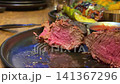barbecue steak and broccoli Gourmet steak dinner plate with mashed potatoes, carrots, broccoli, cherry tomatoes, and sauce. Elegant dining setting. Perfect for food photography, culinary arts. 141367296