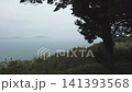 A scenic panoramic view opens from Nokonoshima Island over Hakata Bay in Japan. Dense morning fog completely covers the sea and hides the distant coastline.  141393568