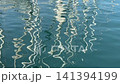Yacht Mast Reflections Dancing on Water 141394199