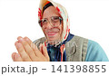 Funny old grandmother rubbing hands together with a sly happy smile on face 141398855