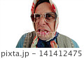 Cross dressing actor as an angry old grandmother shouting and arguing loudly 141412475