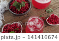 Overhead Shot of Red Currant Drink Beside Bowl of Berries 141416674