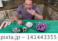 A mam is tasting food at home kitchen 141443355