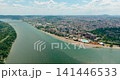Aerial view of Belgrade riverside beach and city skyline across river 141446533